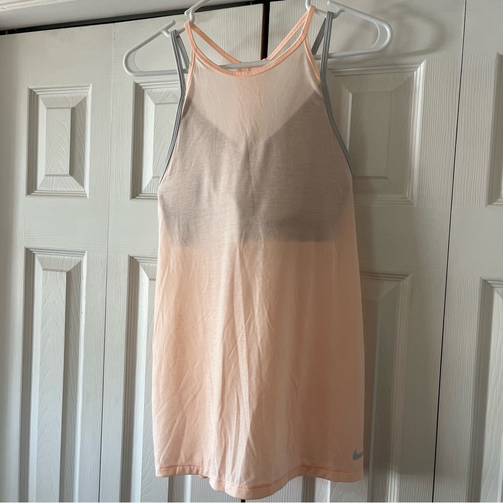 Nike Top Size M, built in bra. NWOT.